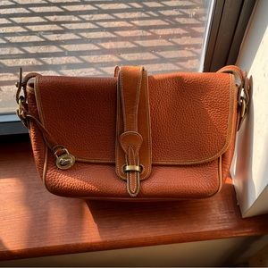 EUC Dooney & Bourke All Weather Leather bag in Tan/Tan with brass hardware.